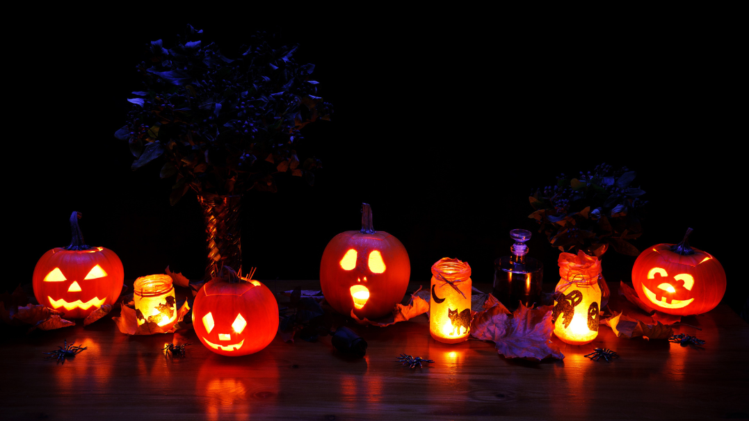 Lit up pumpkins and candles for halloween