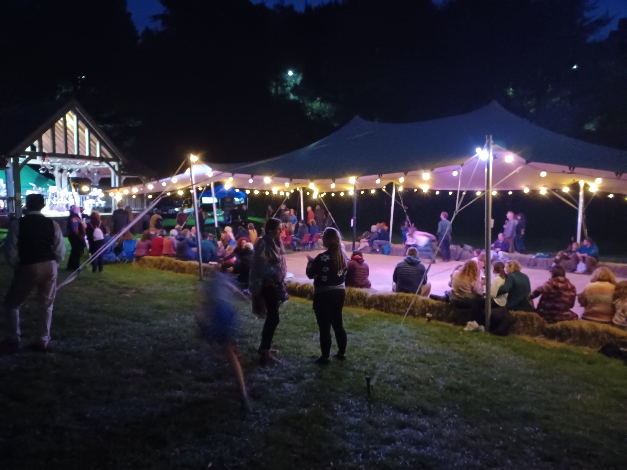 Photo of the festival and stretch tent at night
