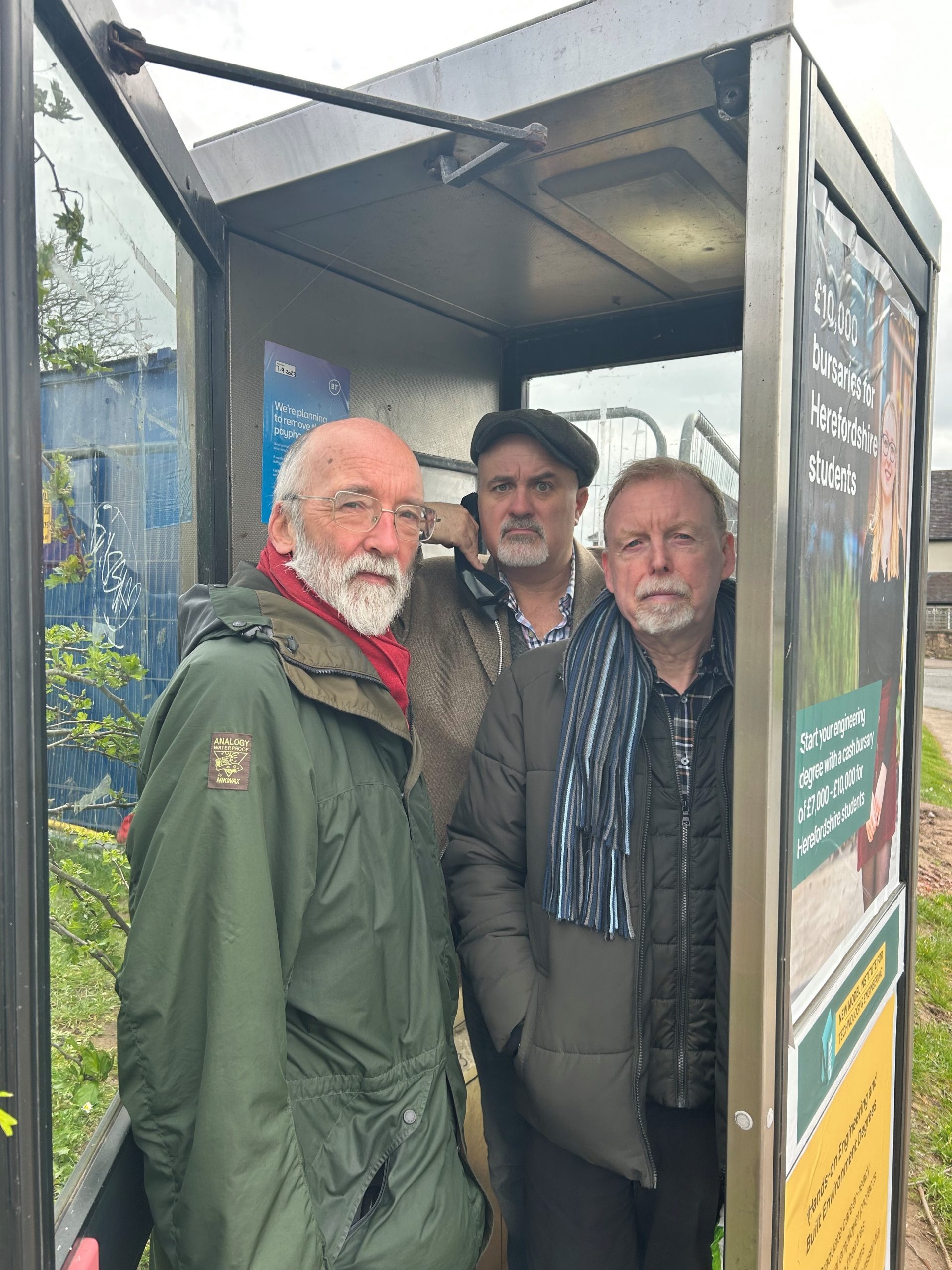 Town Councillors in phone box
